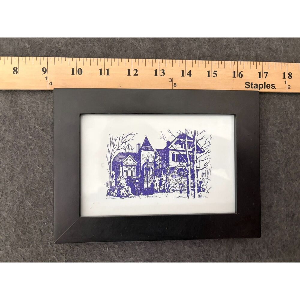 small framed blue ink architectural sketch of a victorian house